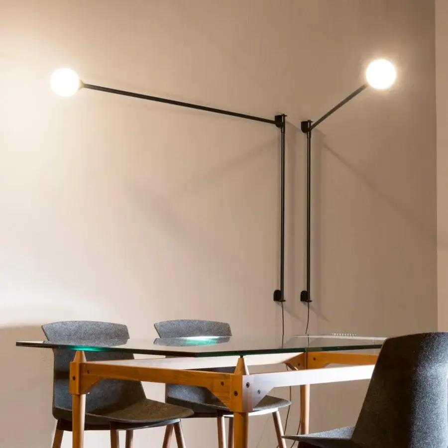 Superior Nemo Lighting Potence Pivotante wall lamp crafted in matte black steel with pivoting arms and spherical white lights