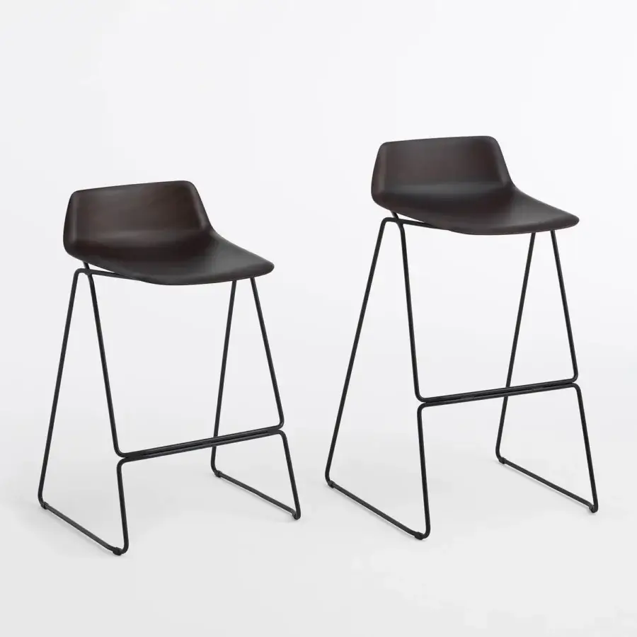 Exceptional Casamania Pressious stool with bent plywood beech seat and black metal sleigh base crafted in Italy