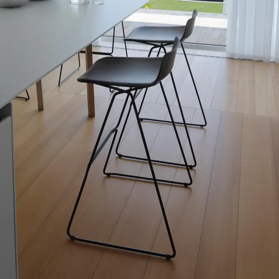 Superior Casamania Pressious stool in matte grey with sleek black metal sleigh base crafted from plywood beech