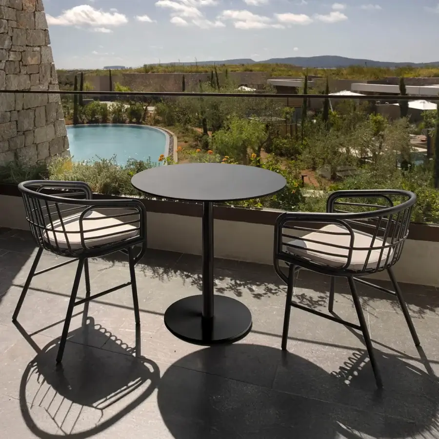 Exceptional Casamania Raphia armchair crafted in painted aluminum with matte black finish and light-colored cushion