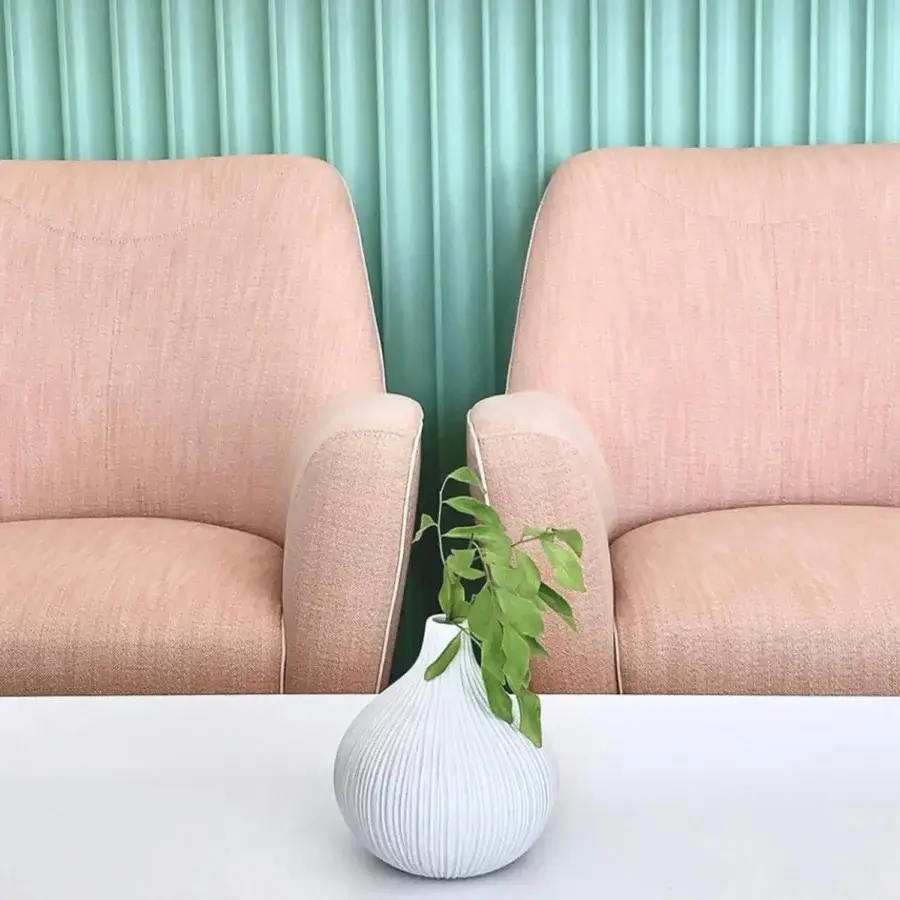 Exceptional Borzalino Eve Plus lounge chair with light pink textile upholstery and discreet gros-grain piping detail crafted in lacquered oak or metal