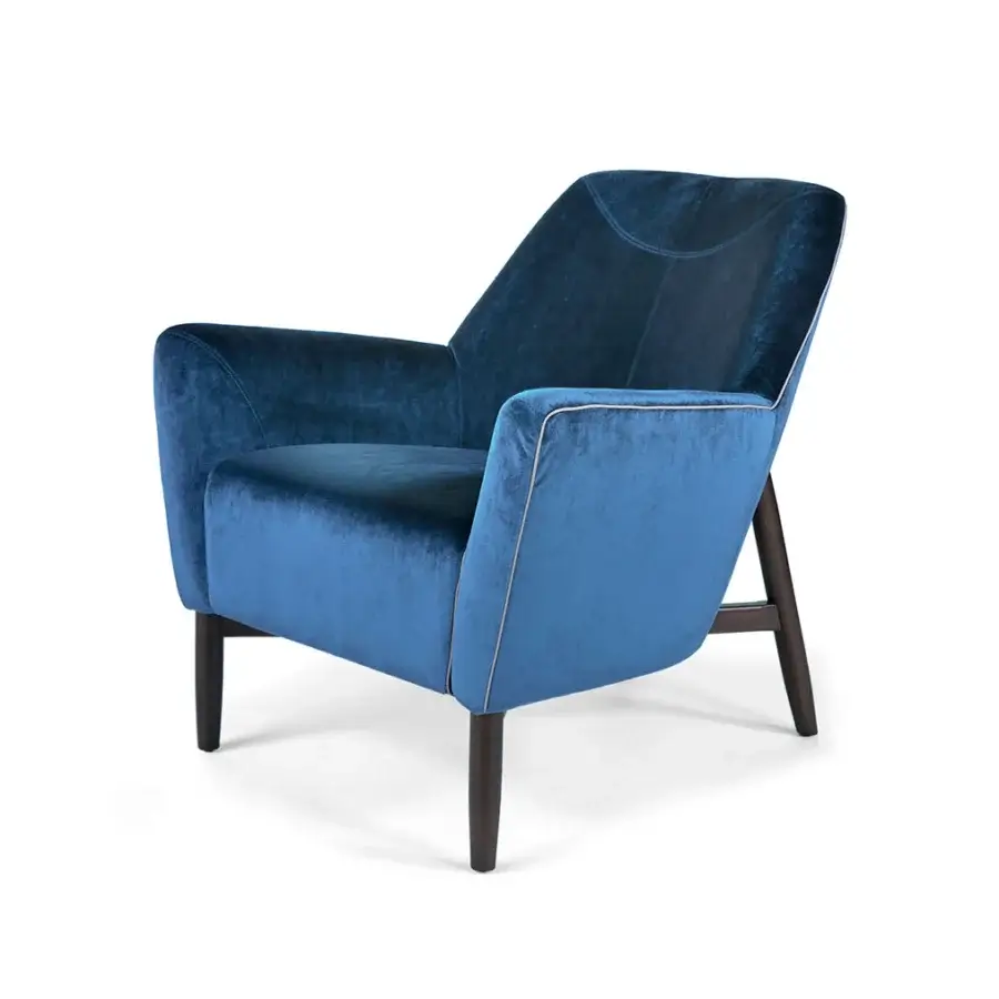 Lavish Borzalino Eve Plus lounge chair with plush blue textile upholstery and light-colored gros-grain piping with lacquered oak legs