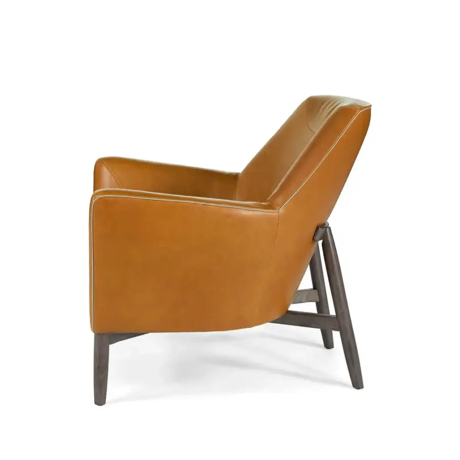 Exceptional Borzalino Eve Plus lounge chair in smooth light tan leather-like material with lacquered dark oak base and saddled stitching