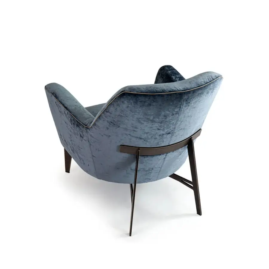 Sophisticated Borzalino Eve Plus lounge chair in plush blue textile with lighter grosgrain piping and dark lacquered metal legs
