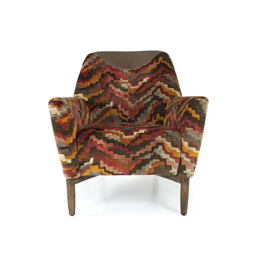 Exceptional Borzalino Eve Plus lounge chair upholstered in patterned textile with red, brown, orange, and yellow hues and lacquered oak base