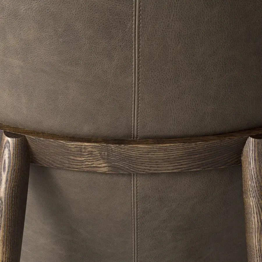 Distinguished Borzalino Eve Plus lounge chair upholstered in supple brown leather with a lacquered oak base and meticulous double stitching