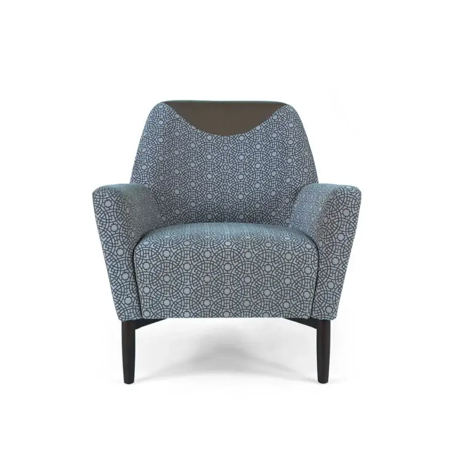 Refined Borzalino Eve Plus lounge chair upholstered in geometric patterned textile with brown leather and lacquered oak legs