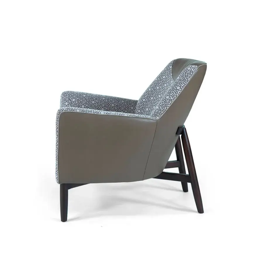 Sophisticated Borzalino Eve Plus lounge chair with grayish-taupe outer material and patterned gray inner surfaces built with lacquered oak wood legs