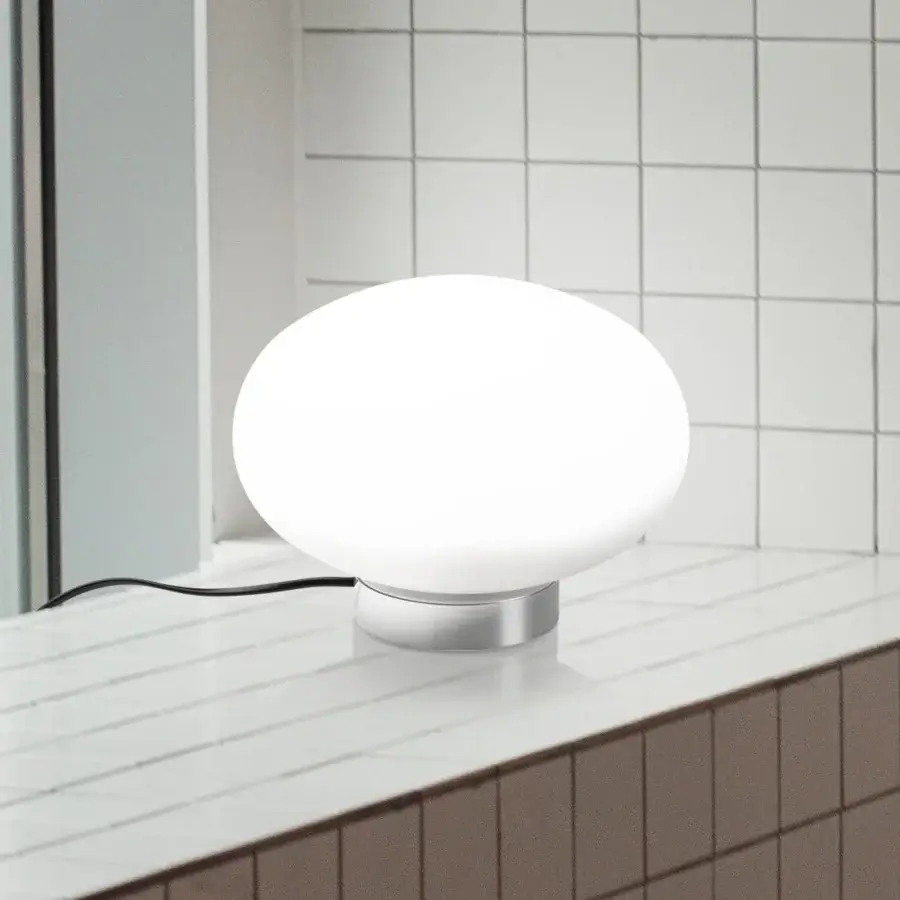 Elegant Nemo Lighting Maga lamp with an elliptical opal blown glass sphere and glossy cylindrical base