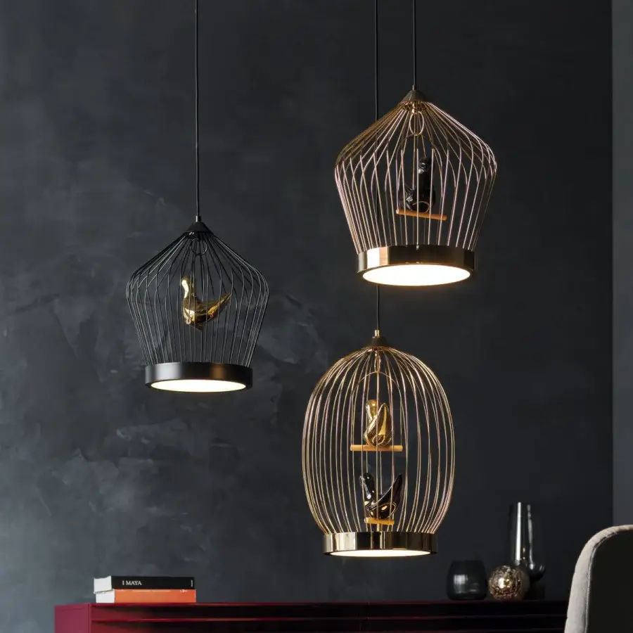 Lavish Casamania Twee T suspension lamp with a gold-plated metal rod cage and handcrafted ceramic bird within polycarbonate fixtures