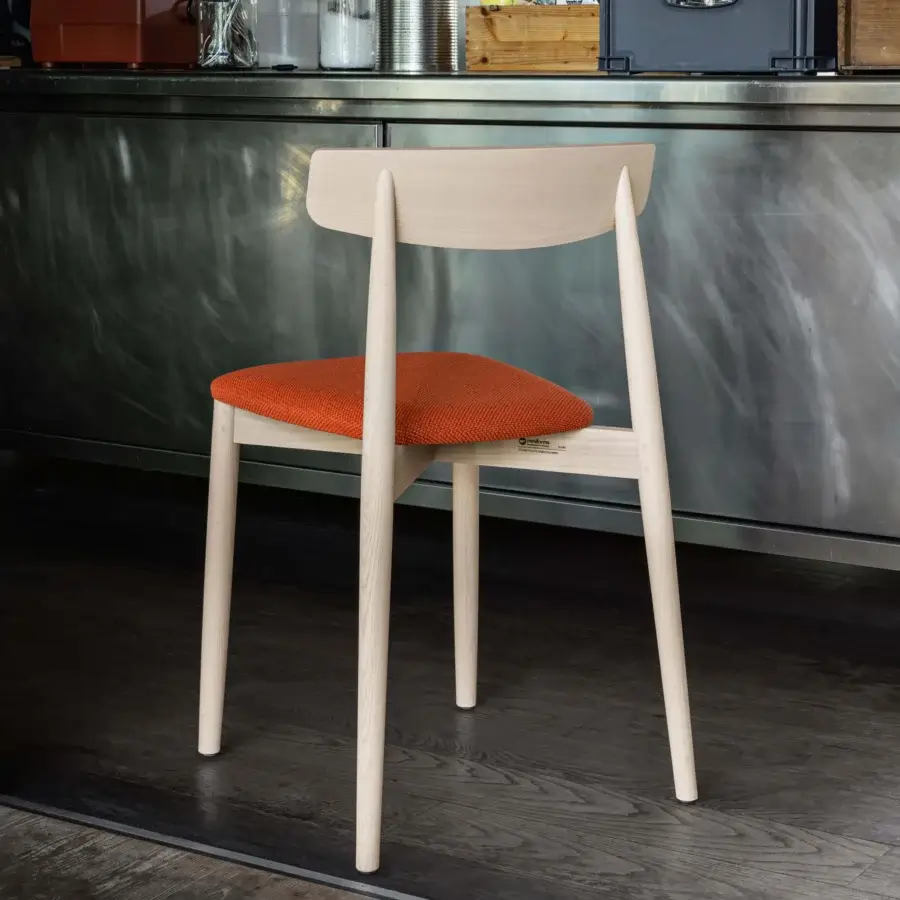 Elegant Miniforms Claretta chair with light wood frame and orange fabric seat crafted in Italy