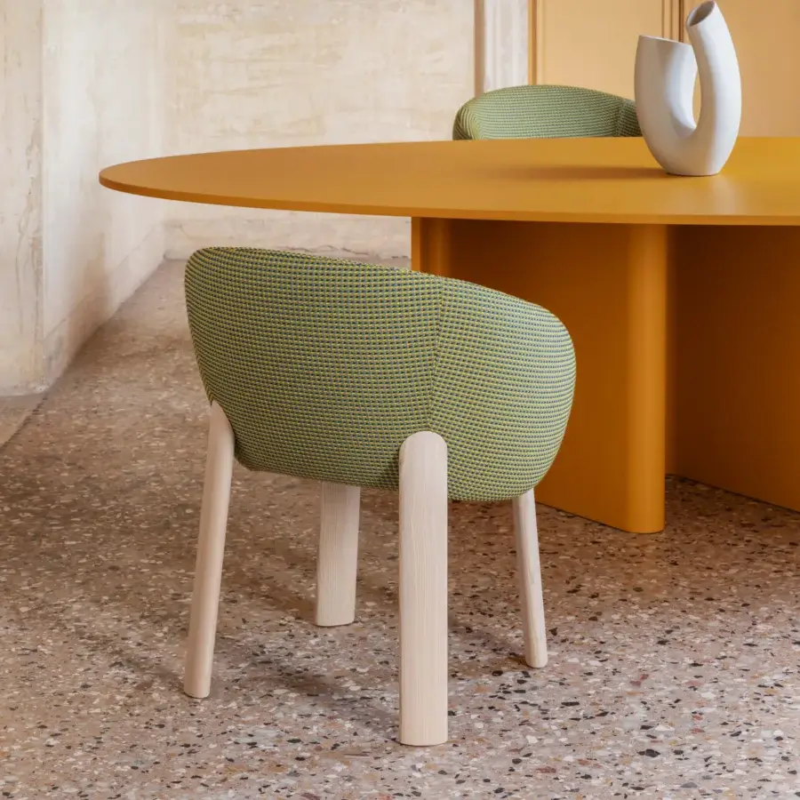 Superior Miniforms Nebula Wood chair with enveloping design in woven yellow and blue-green textiles and smooth light-toned wooden legs