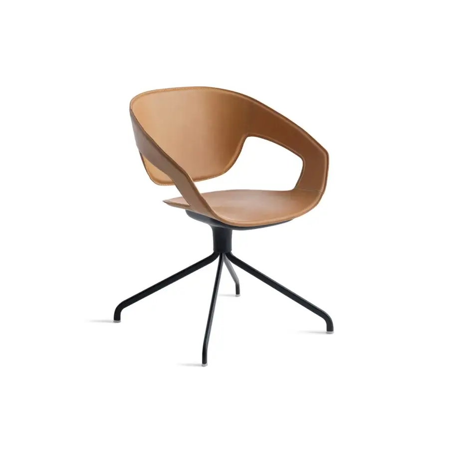Elegant Casamania Vad armchair with curved shell in smooth tan hard leather and black metal swiveling base