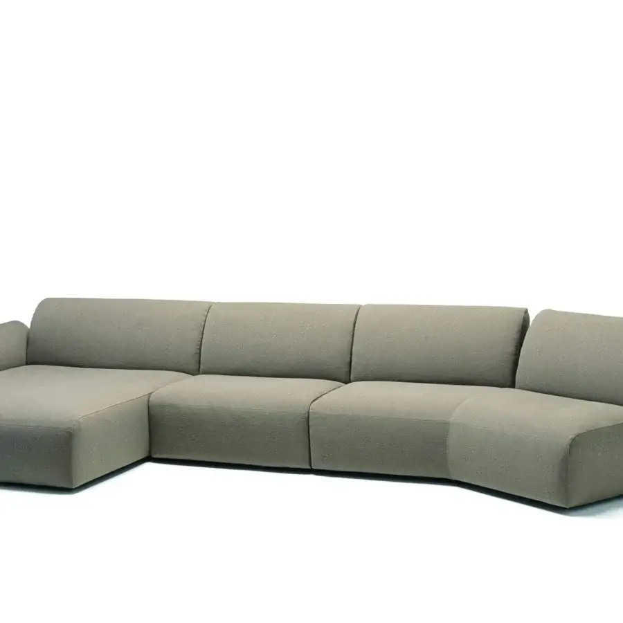 Distinguished Frag Hug sectional with geometric forms and curved sections upholstered in light grayish-beige textile with matte finish