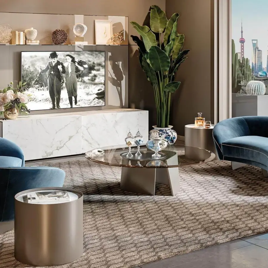 Lavish Reflex Segno sofa lounge upholstered in vibrant blue velvet with bronze finished metal legs