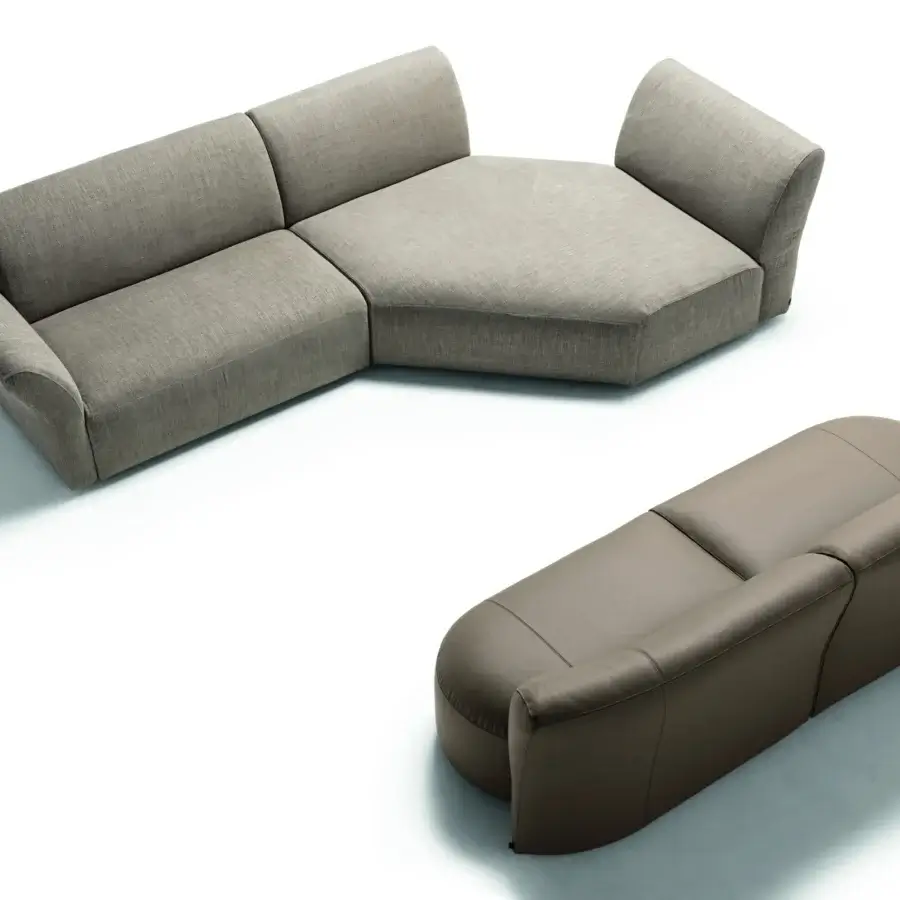 Exclusive Frag Hug sectional with geometric modularity and enveloping backrests upholstered in light grey textured textile with smooth taupe seating