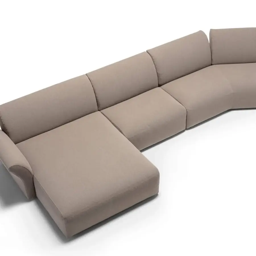 Superior Frag Hug sectional with geometric forms and subtly curved armrests upholstered in light beige textile crafted in Italy