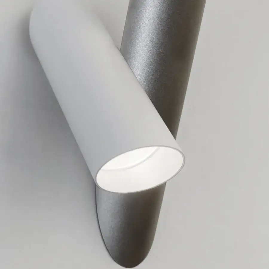 Superior Nemo Tubes Wall Lamp crafted in aluminum with a matte white cylinder and reflective gray support