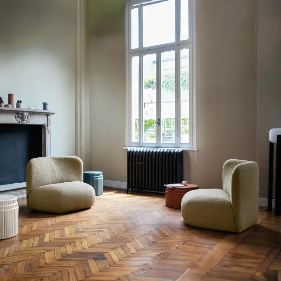 Exceptional Miniforms Botera lounge chair with rounded silhouette and textured beige textile upholstery