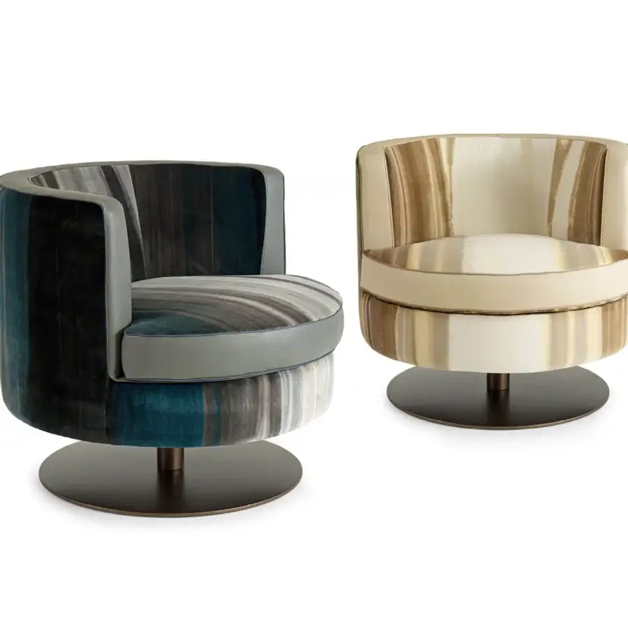Superior Borzalino Frisbee lounge chair in dark blue, gray, and black striped fabric with swirling patterned cushioning and sleek metal swivel base