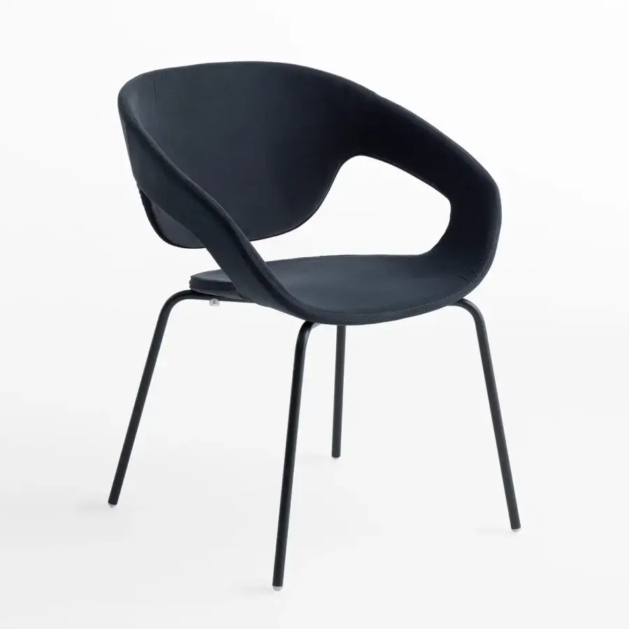 Distinguished Casamania Vad armchair with dark premium fabric upholstery, slender metal legs and matte finish