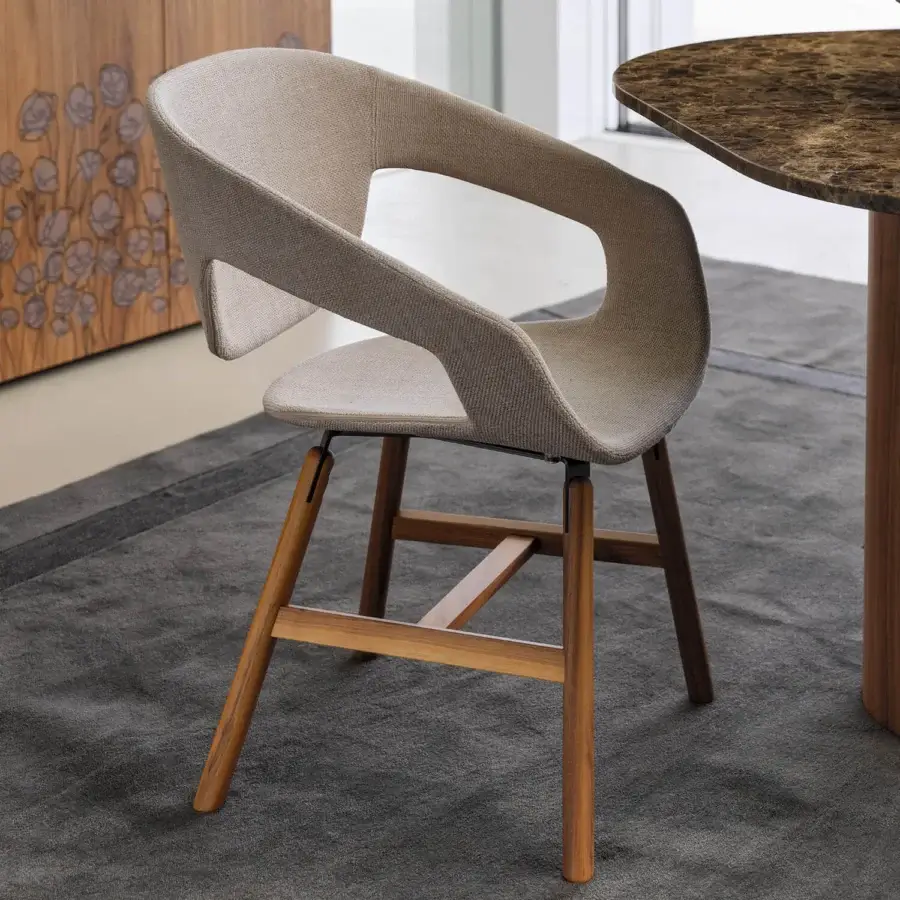 Superior Casamania Vad armchair with light beige fabric upholstery and high-end wood base in a matte finish