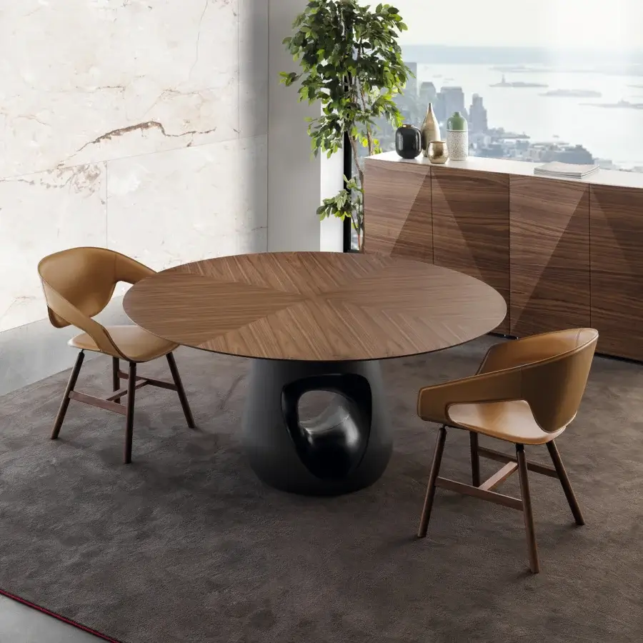 Distinguished Casamania Vad armchair with premium hard leather upholstery and a light tan smooth finish built with a matte wooden base