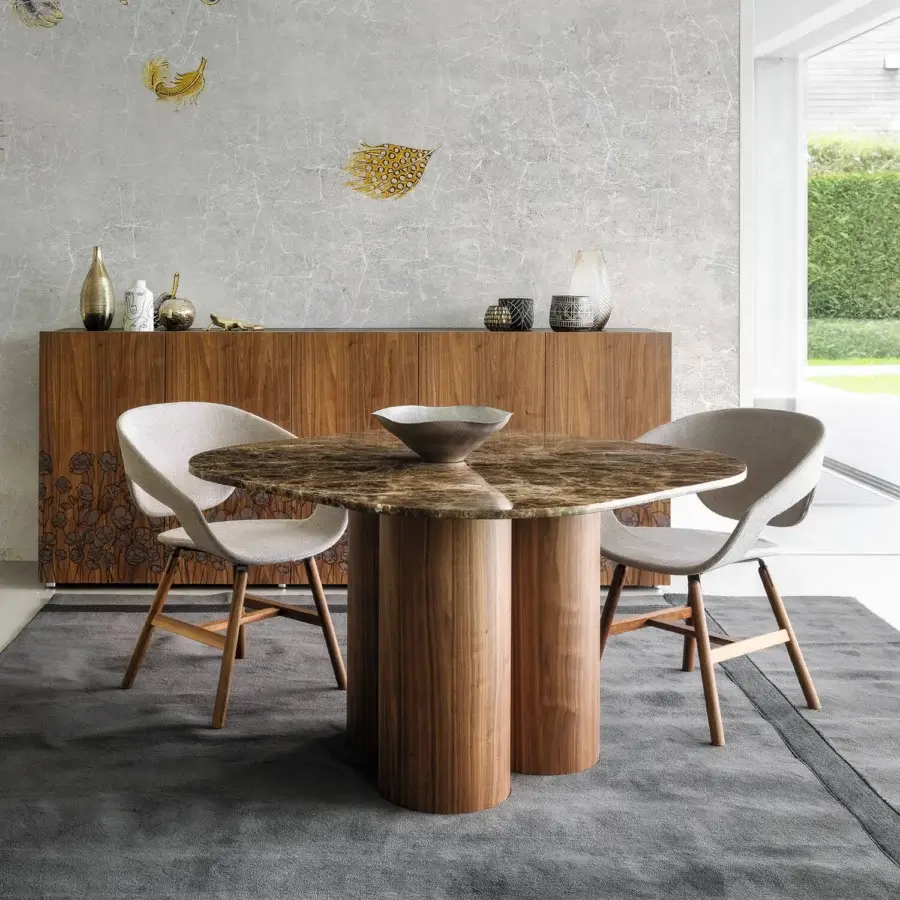 Distinguished Casamania Vad armchair with curved form and light gray fabric upholstery built with a light brown wooden base