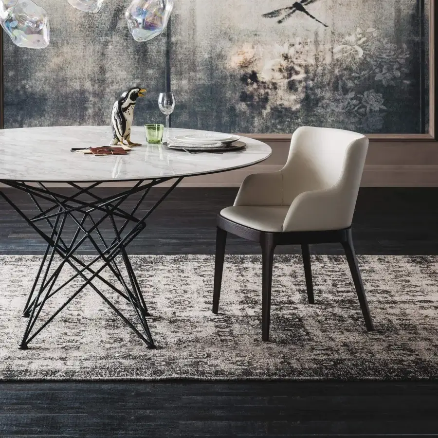 Elegant Cattelan Italia Magda chair with enveloping backrest and solid dark wood frame in neutral textile upholstery
