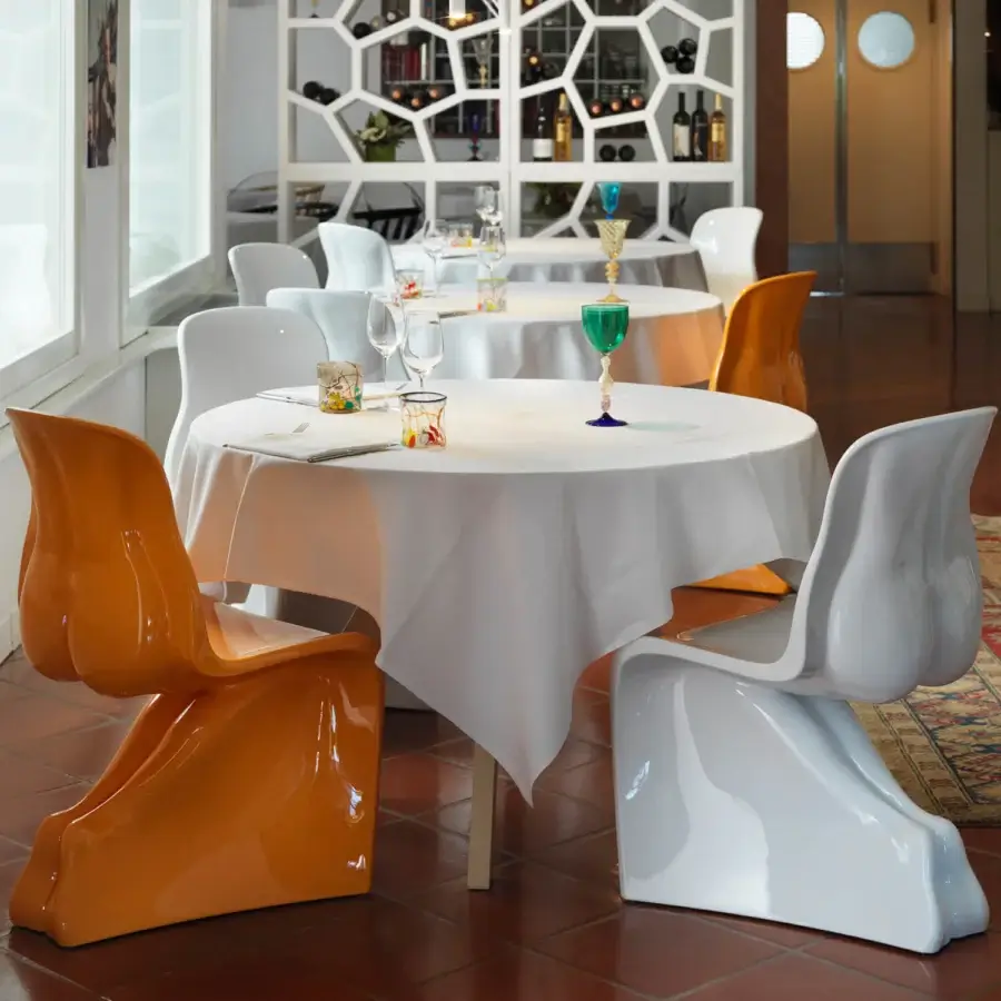 Exceptional Casamania Him & Her chair molded in glossy white rotationally mass-dyed polyethylene with curvaceous organic form