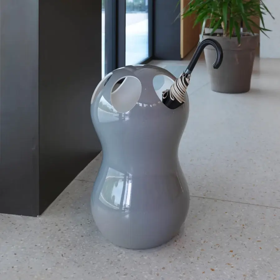 Exceptional Casamania Zontik umbrella stand with organic silhouette crafted in glossy grey synthetic material