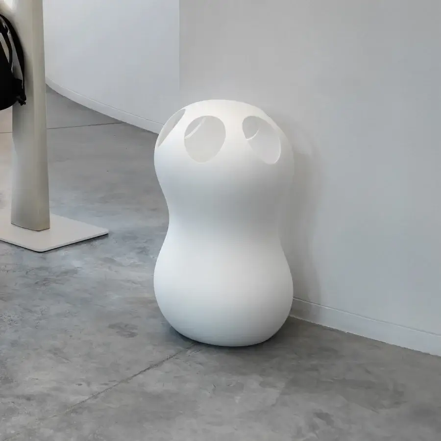 Superior Casamania Zontik umbrella stand with organic form crafted in mass-dyed polyethylene and smooth matte finish