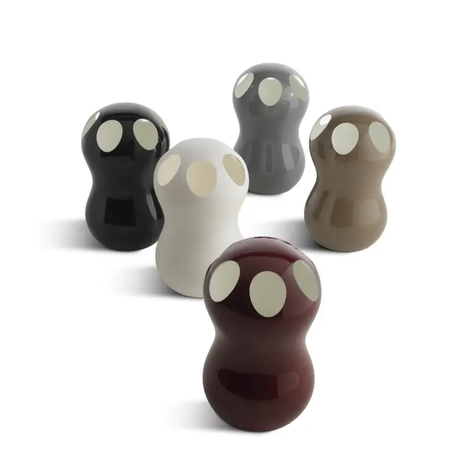 Distinguished Casamania Zontik umbrella stand with organic silhouette crafted in glossy burgundy painted plastic featuring circular cutouts