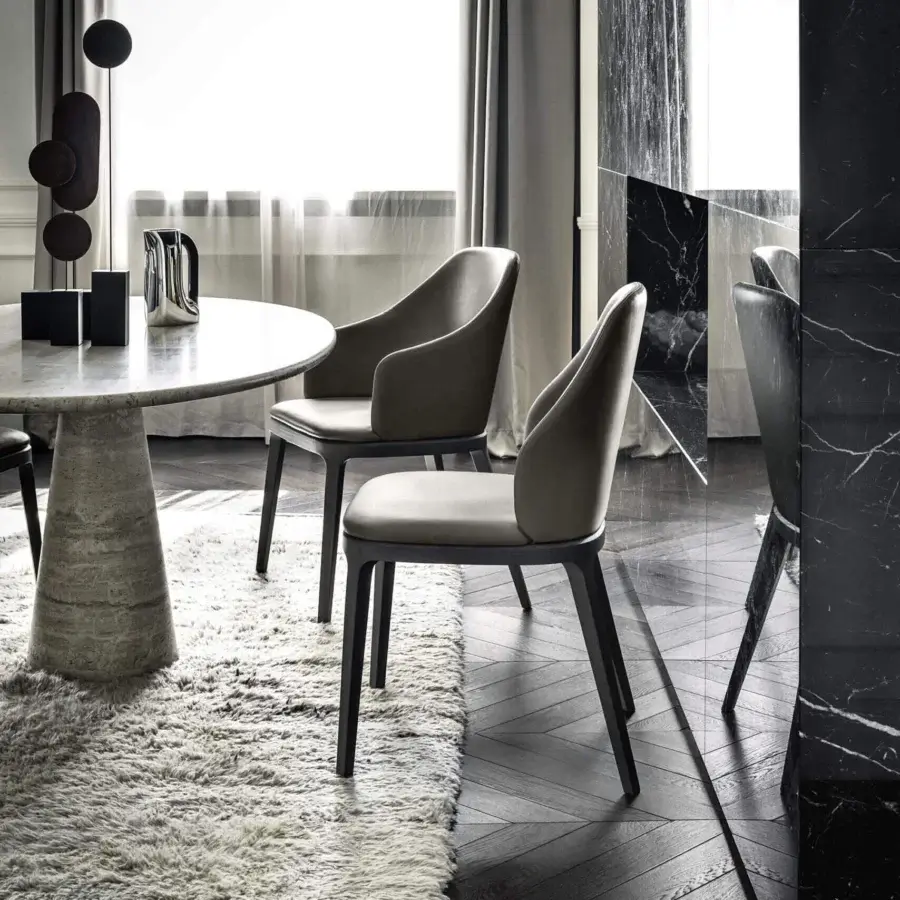 Distinguished Frag Doa chair with curved lines crafted in Italy with gray textile and matte timber frame