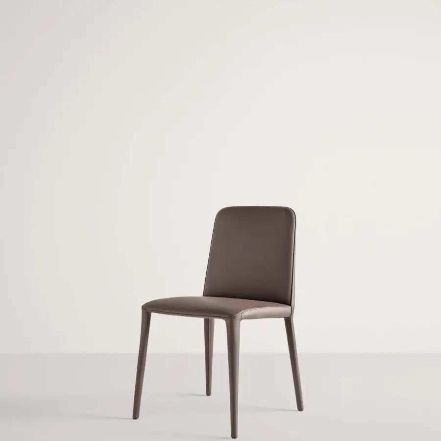 Captivating Frag Elf chair with supple leather upholstery, tapered lines and a matte finish in a muted brown tone