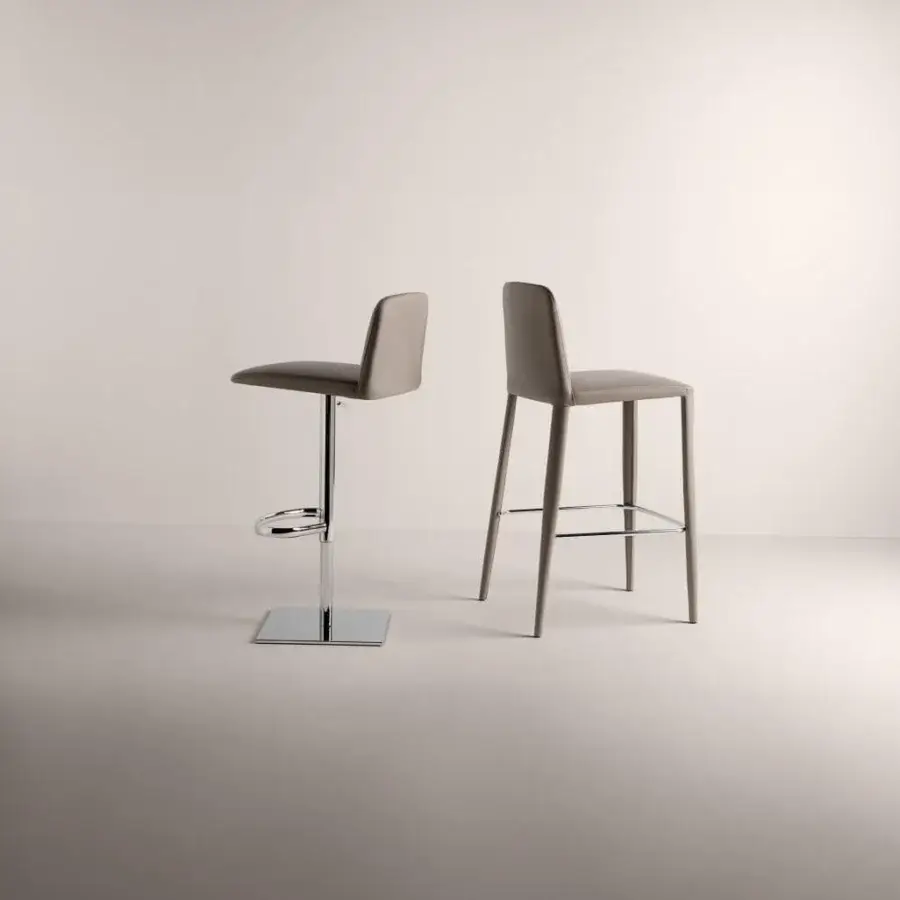 Captivating Frag Elf stool crafted in Italy with taupe upholstery and a sleek chrome base maintains a contemporary profile
