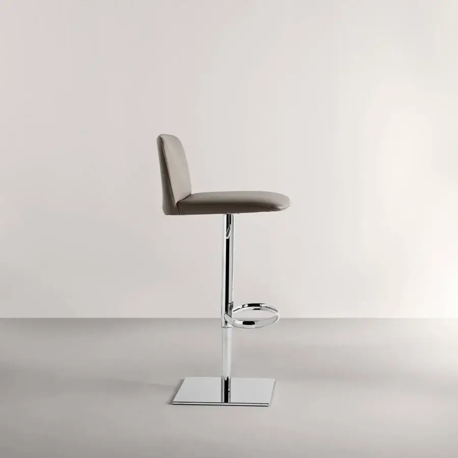 Superior Frag Elf stool upholstered in smooth matte gray fabric with a polished metal base and circular footrest