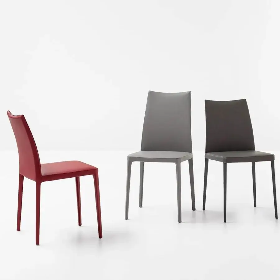Sophisticated Bonaldo Kayla Up chair with light grey fabric upholstery and slender matte metal legs