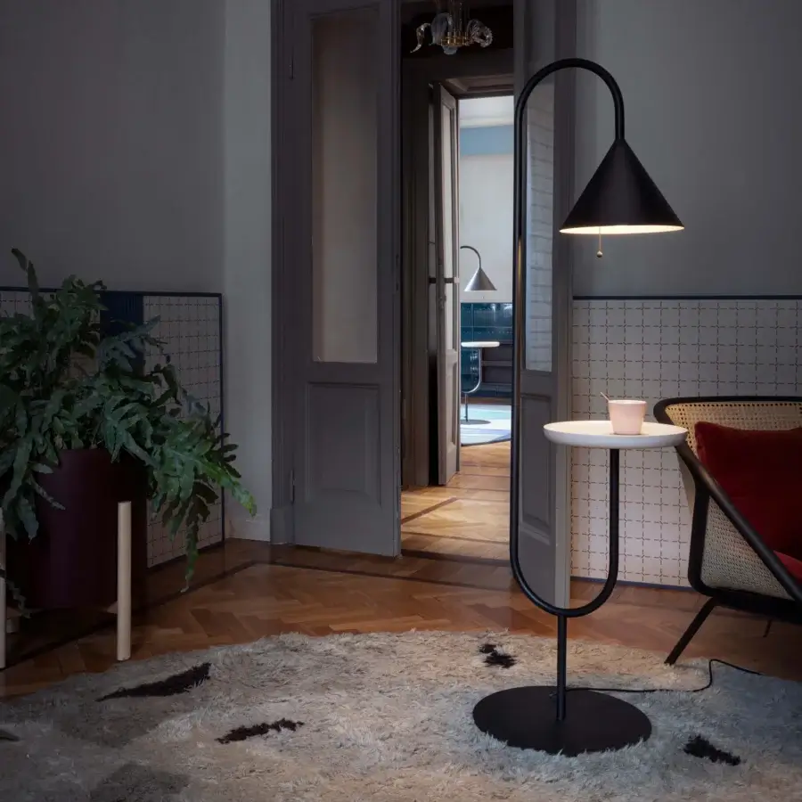 Exceptional Miniforms Ozz floor lamp with curved black metal frame and integrated white conical table