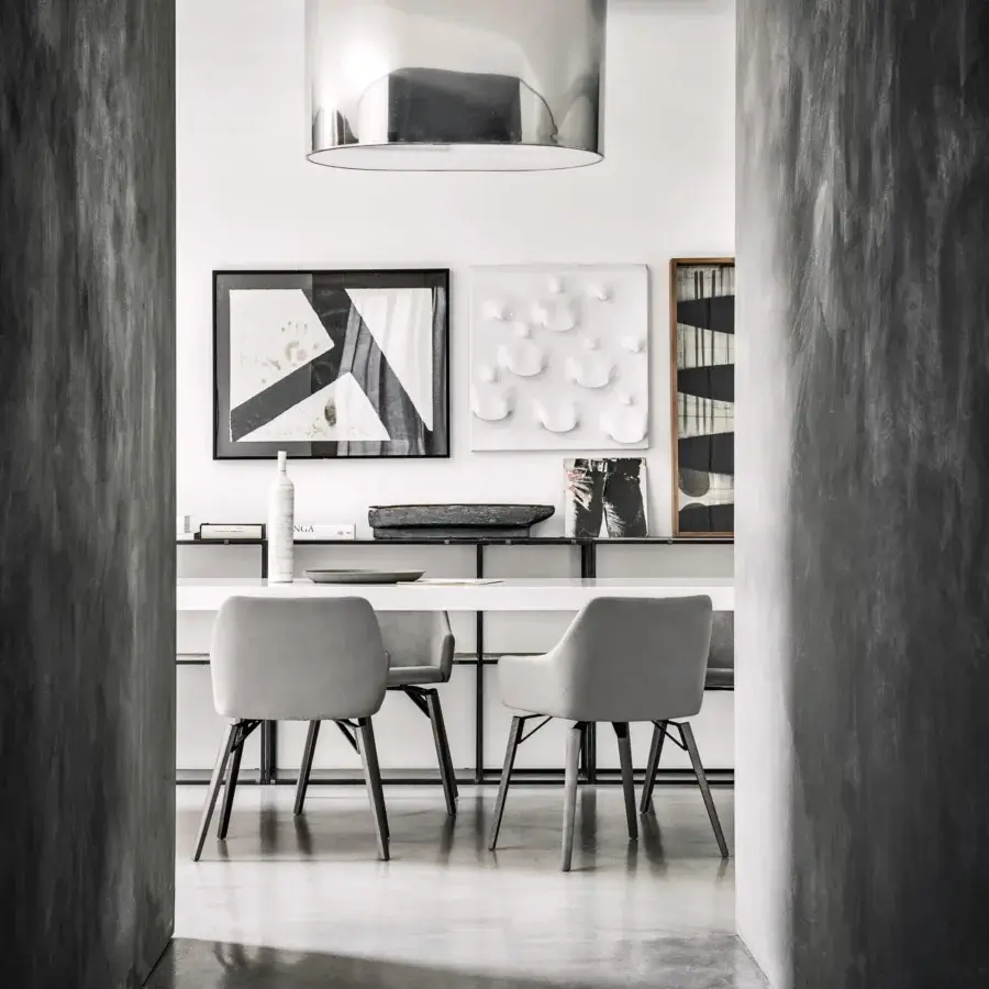 Elegant Frag Iki chair with light gray textile upholstery and dark-toned wood with metal legs crafted in Italy