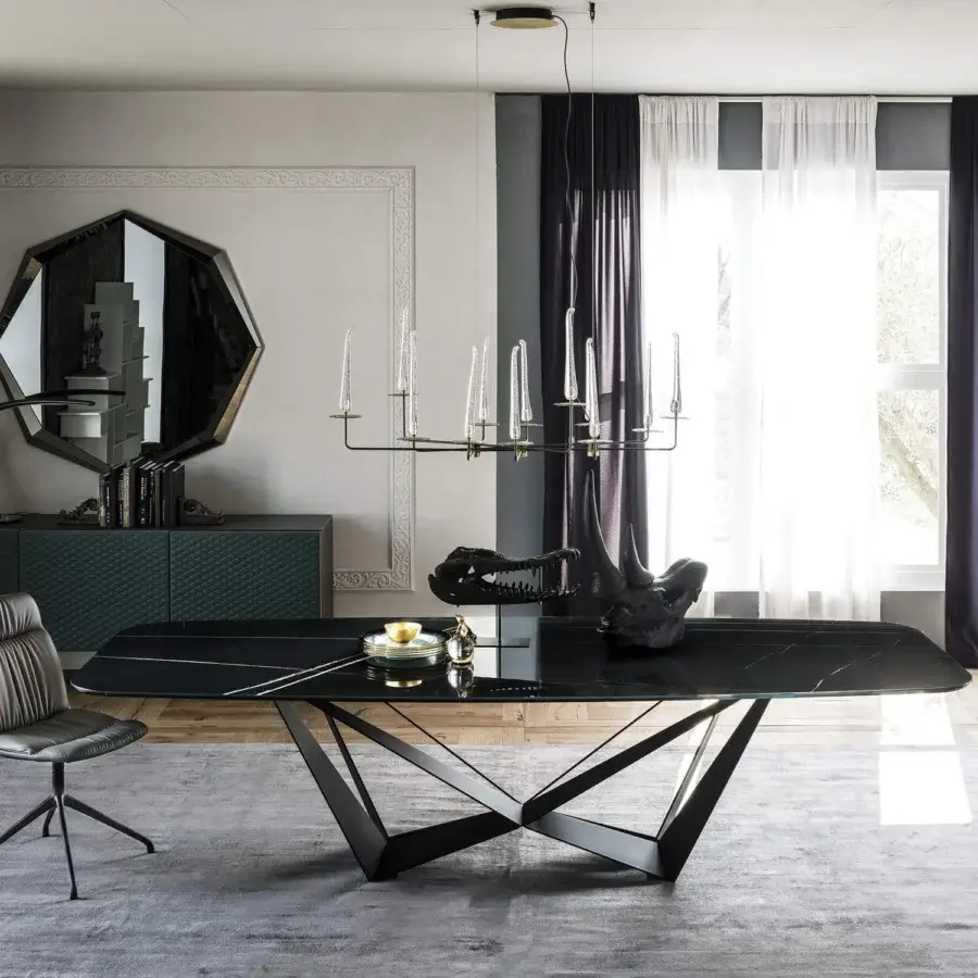 Distinctive Cattelan Italia Skorpio table with glossy Marmi ceramic top and intersecting black embossed lacquered steel base