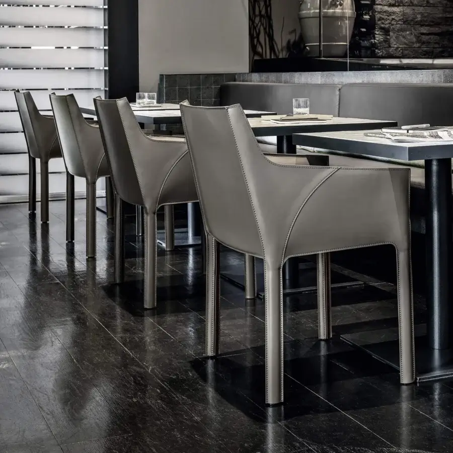Superior Frag Nisida chair upholstered in muted gray Saddle Leather with a matte metal frame and skilled workmanship