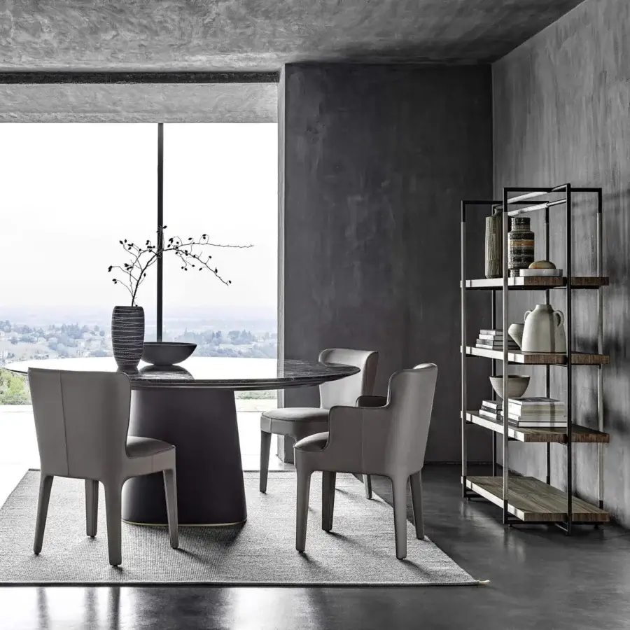 Superior Frag Public chair with continuous lines forming legs, seat, and backrest upholstered in muted gray synthetic leather with matte finish