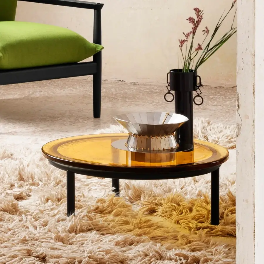 Superior Miniforms Zigo coffee table with concentric circles, amber-toned wood top, glossy finish and sleek black legs