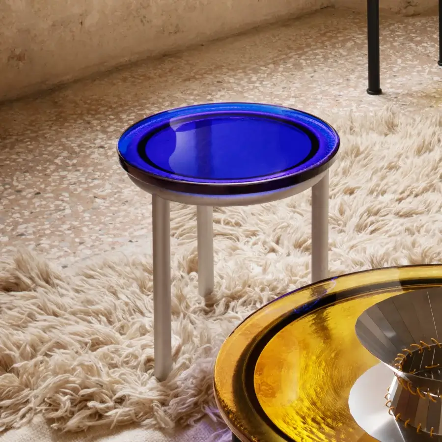 Distinguished Miniforms Zigo side table with rippling vibrant blue cast glass and matte cylindrical metal legs