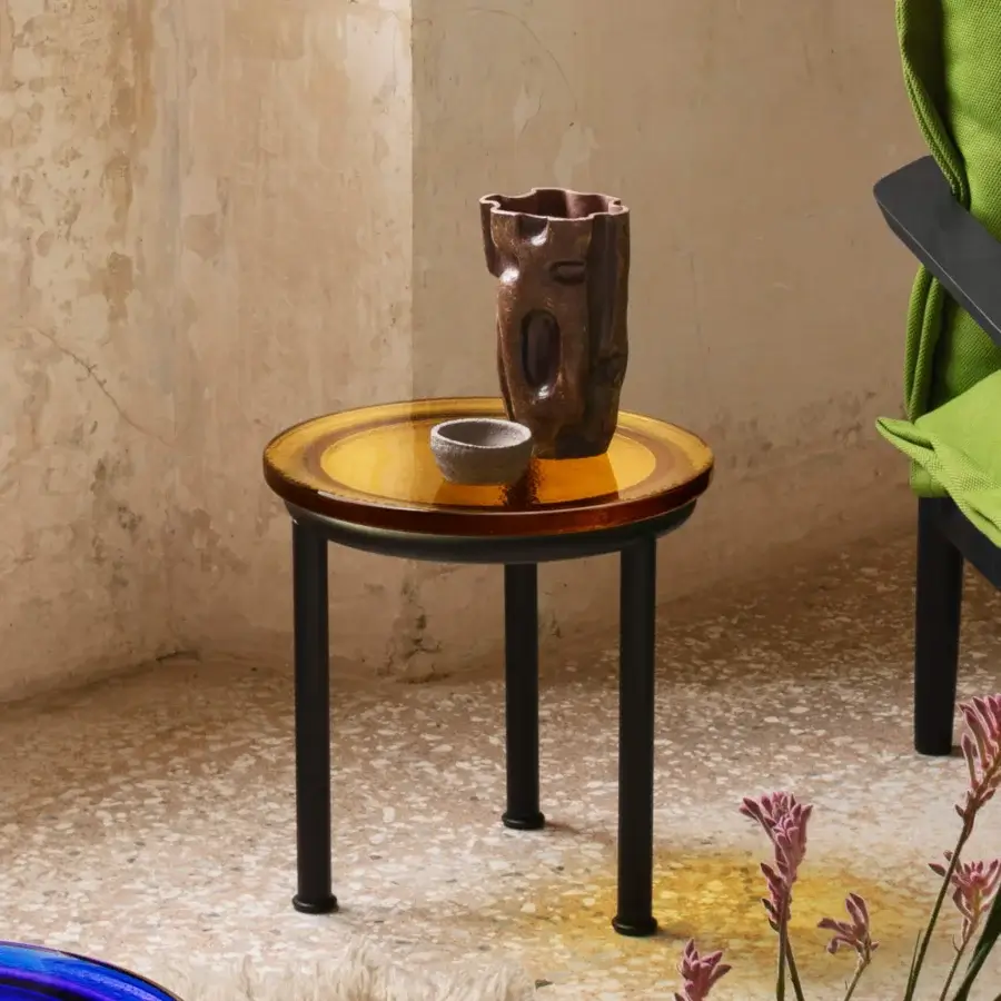 Exceptional Miniforms Zigo side table with rippling amber cast glass and matte black metal legs