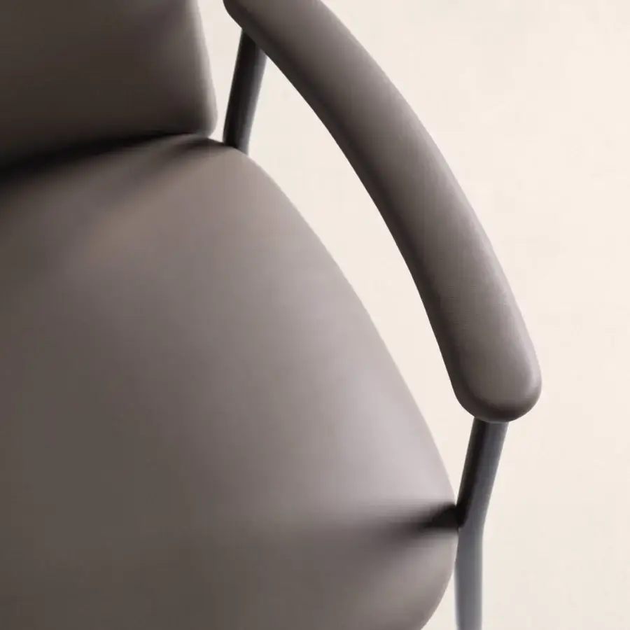 Distinguished Frag Siloe chair with muted taupe upholstery and sleek metal frame offering curved armrests