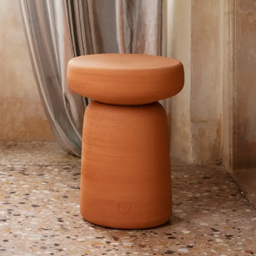 Distinctive Miniforms Tototò side table crafted from terracotta in an earthy orange-brown hue with a textured matte finish