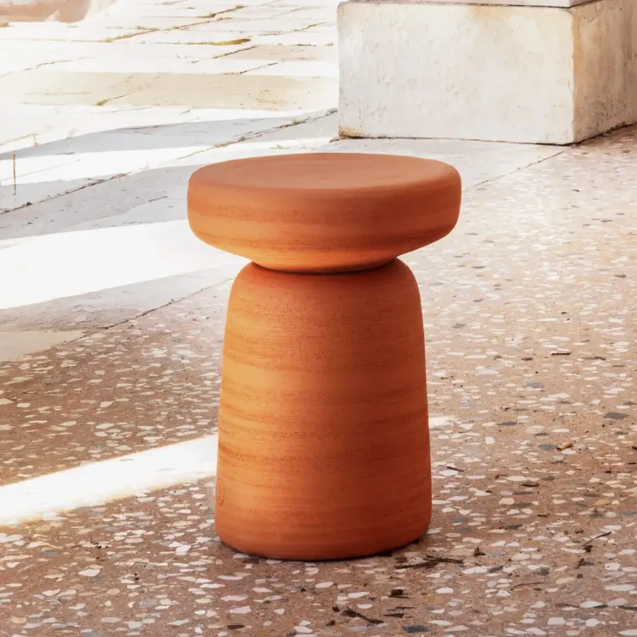 Elegant Miniforms Tototò side table crafted from reddish-brown terracotta with a textured artisan finish