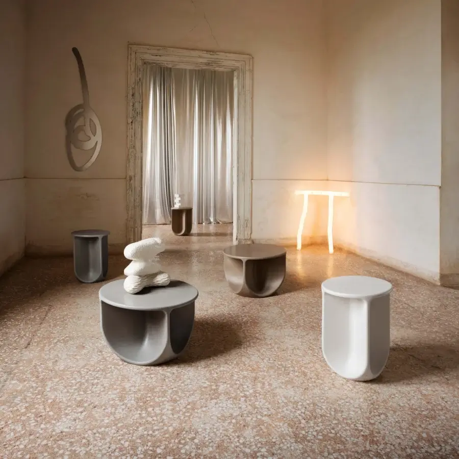 Elegant Miniforms Pinto coffee table crafted in light gray with rounded geometric form and U-shaped cutouts for modern living spaces